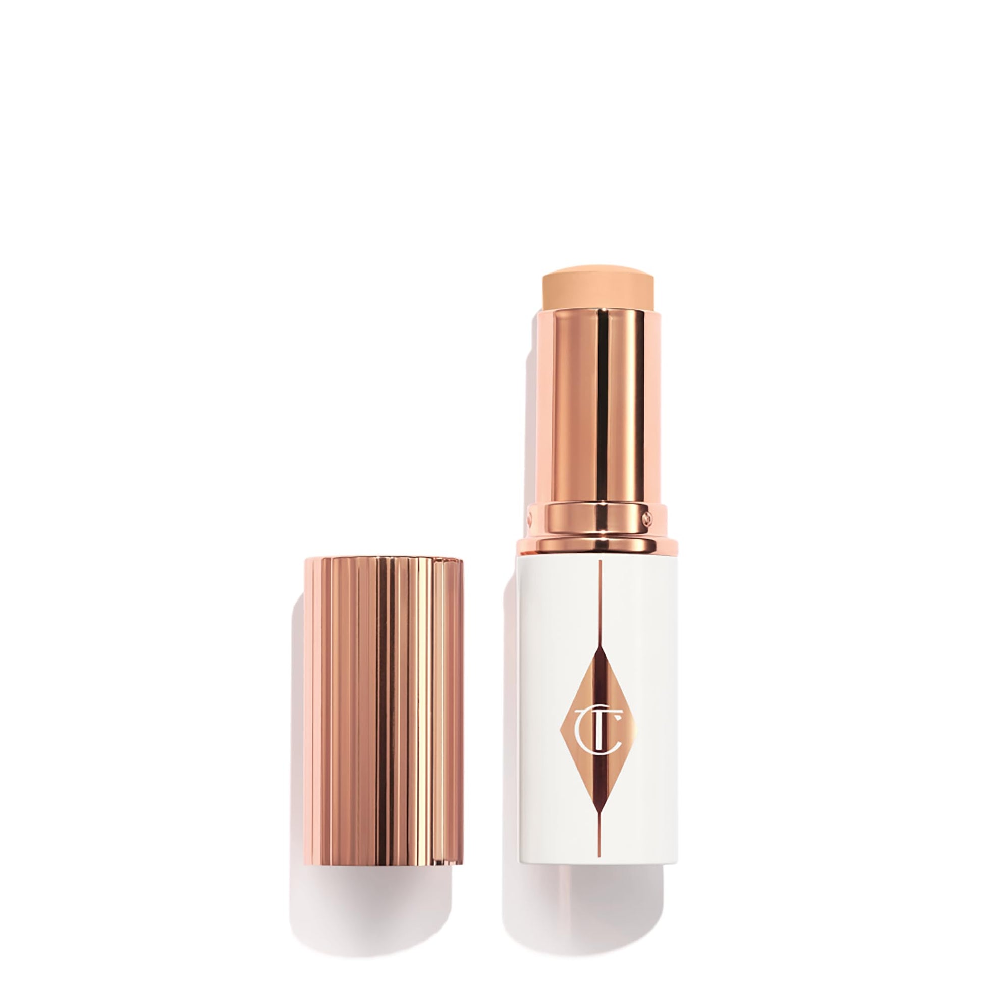 Charlotte Tilbury Unreal Skin Tint & Sheer Glow Hydrating Foundation Stick - Cream Foundation Makeup with Sheer-to-Light Coverage & a Buildable Formula - Blurring, Smoothing & Nourishing - 3 Fair Charlotte Tilbury uk supplements