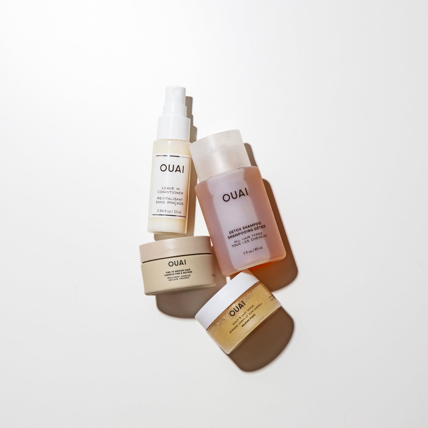 OUAI Travel Kit - Includes Travel Size Leave In Conditioner, Detox Shampoo, Fine to Medium Hair Mask, Scalp & Body Scrub (4 Count) OUAI uk supplements