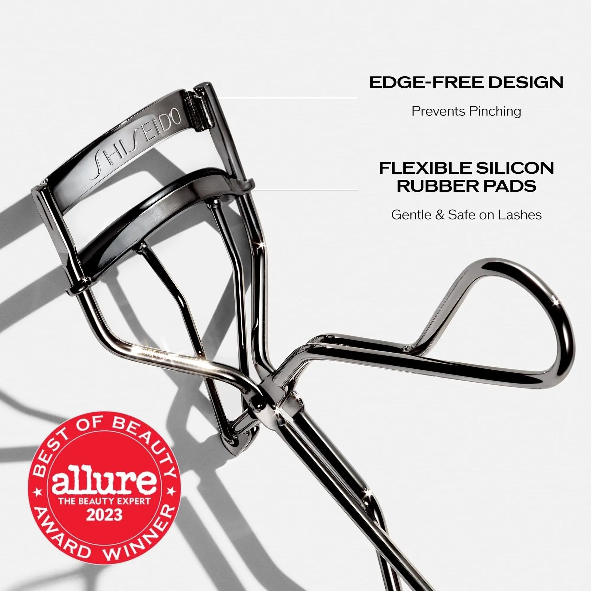 Shiseido Eyelash Curler - Crimps & Curls Lashes for Perfect, Eye-Framing Fringe - Gentle & Safe - Includes Replacement Pad Shiseido uk supplements